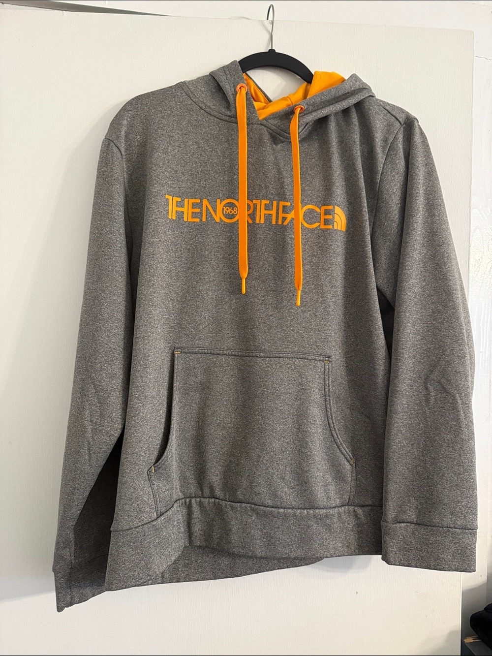 The North Face Gray Pullover Hoodie with Orange Logo